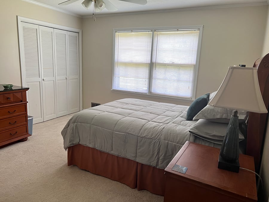 Bedroom 3- bright large bedroom with queen pillow top bed, 2 closets, 2 nightstands, 2 windows, dresser and chair
