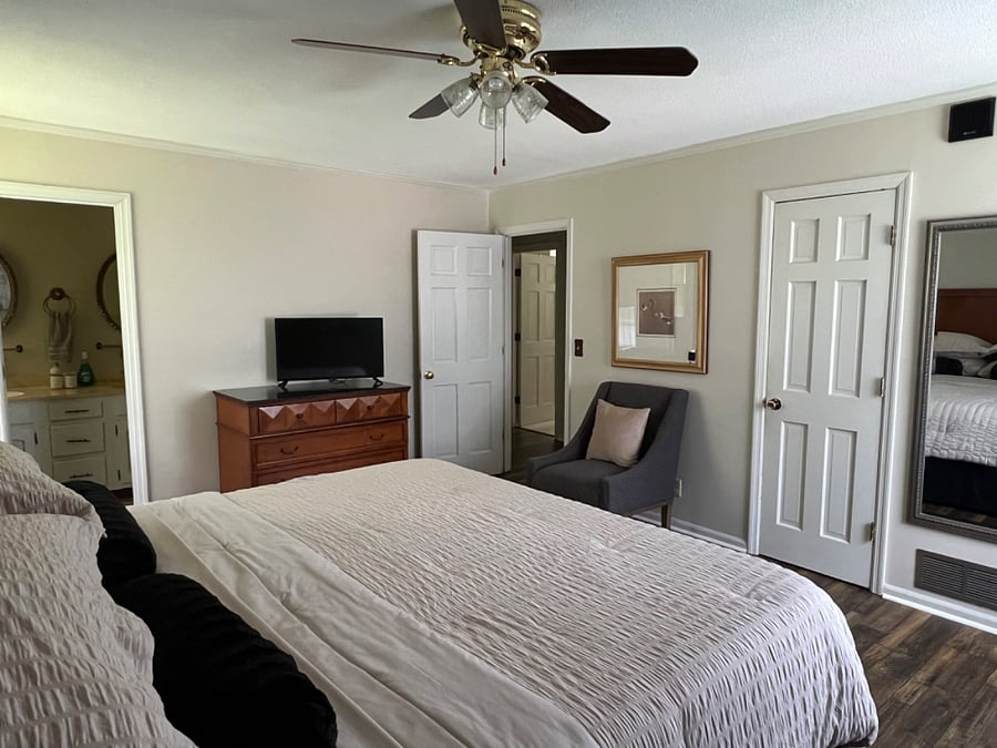 Bedroom 1-Large primary suite with king bed, 2 closets, TV, access to private bathroom
