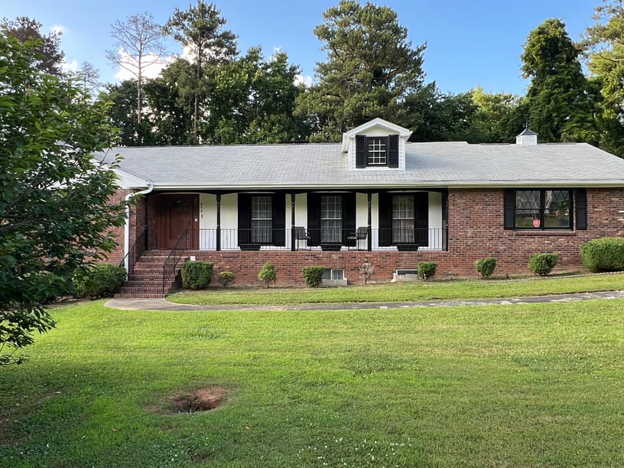 large window views from home office and living/dining to front door porch.