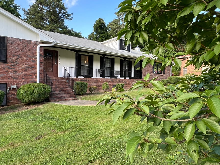 Front entry with covered patio access to carport