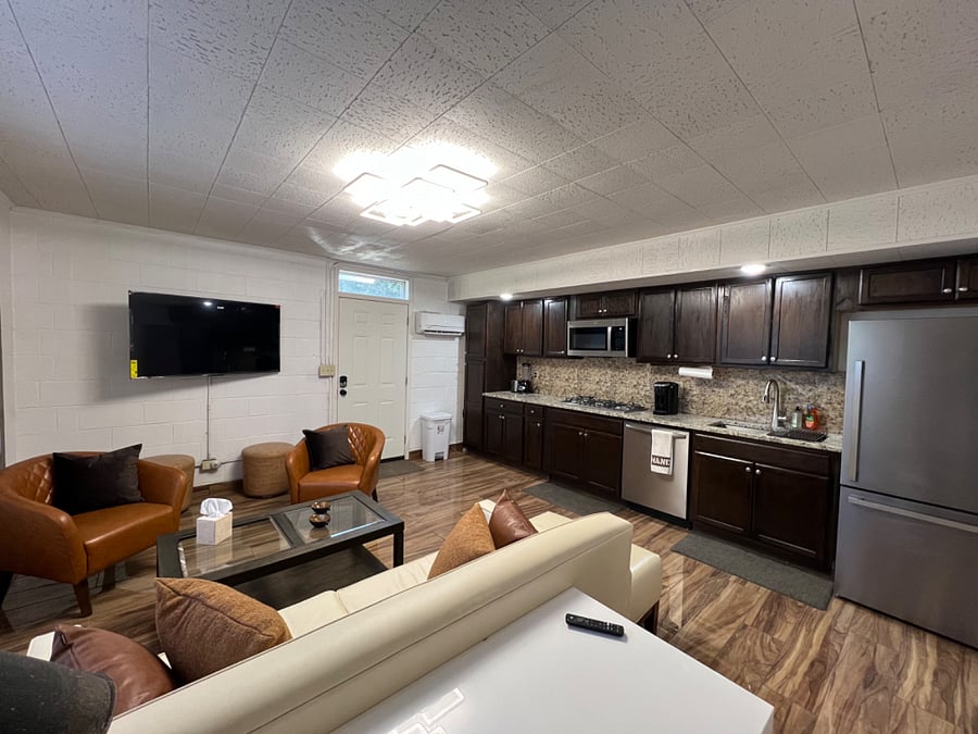 Open floor plan with desk area and in unit heat & AC, 