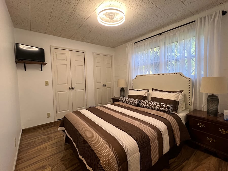 PillowTop-Queen-size bed, large closet in room laundry area, TV, Ceiling Fan large Windows 