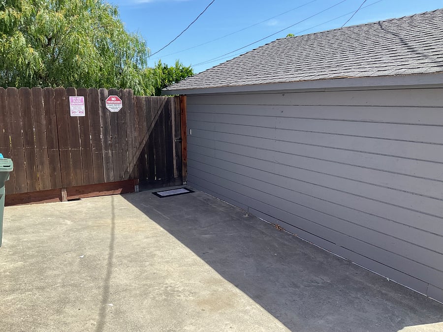 This is the parking space with keypad entry through gate.