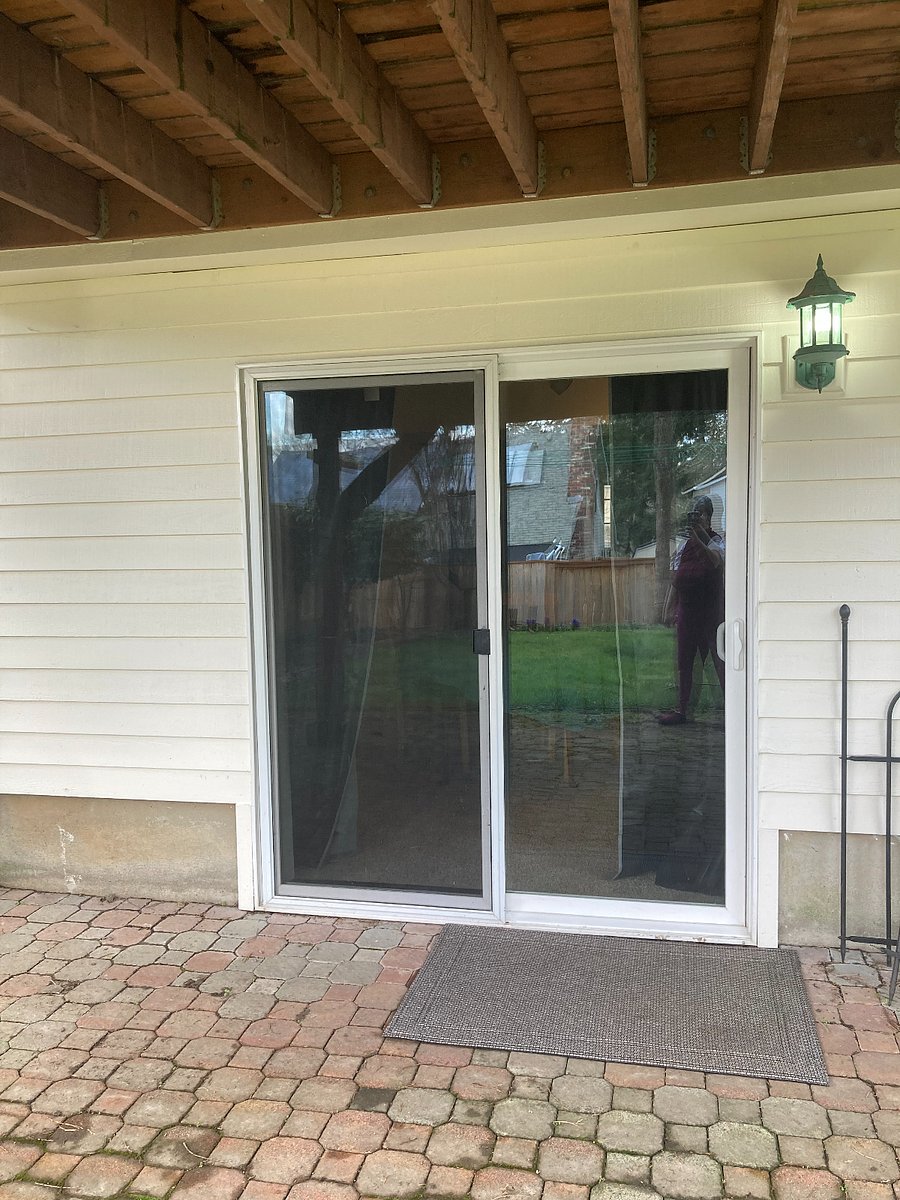 This sliding door is your private entrance to the unit, from the back yard. 