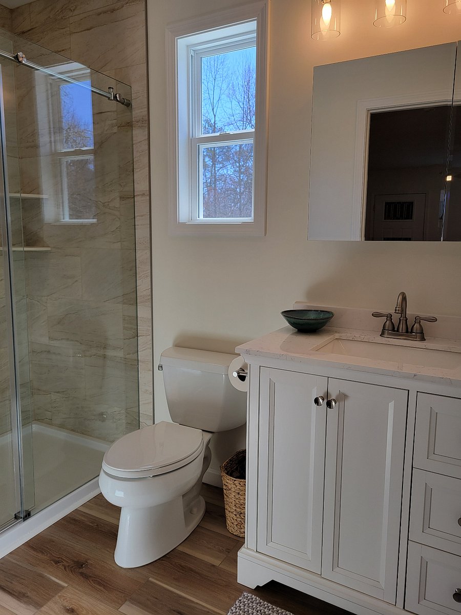Bathroom with walk-in tile shower