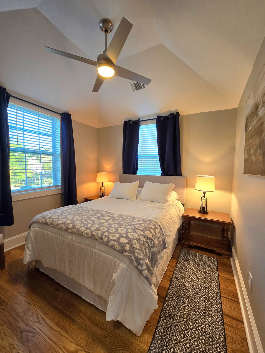 Master bedroom with a queen size and smart TV