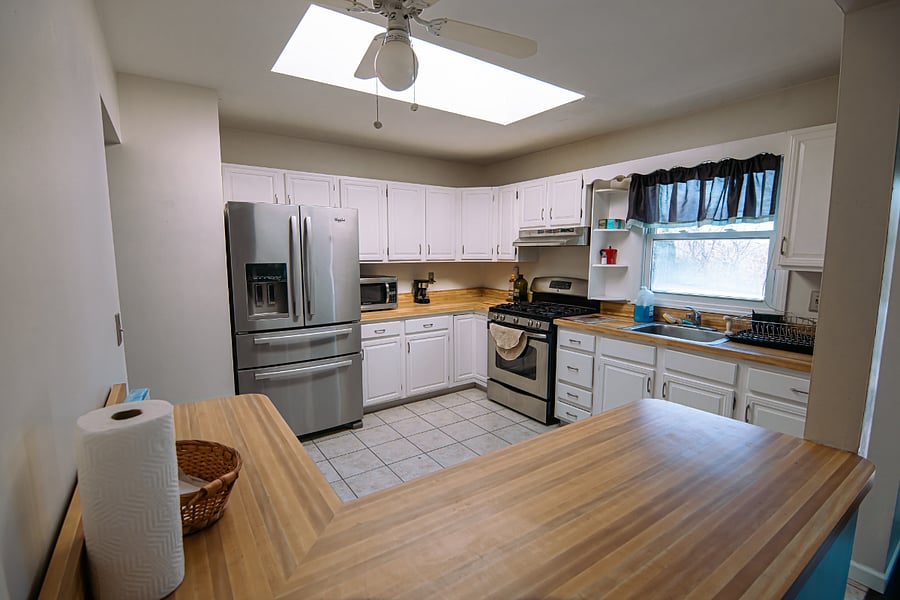 Large kitchen with skylight