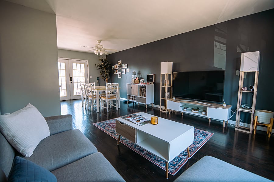 Living room with smart TV and 6 people dining table, vinyl collection, porch access