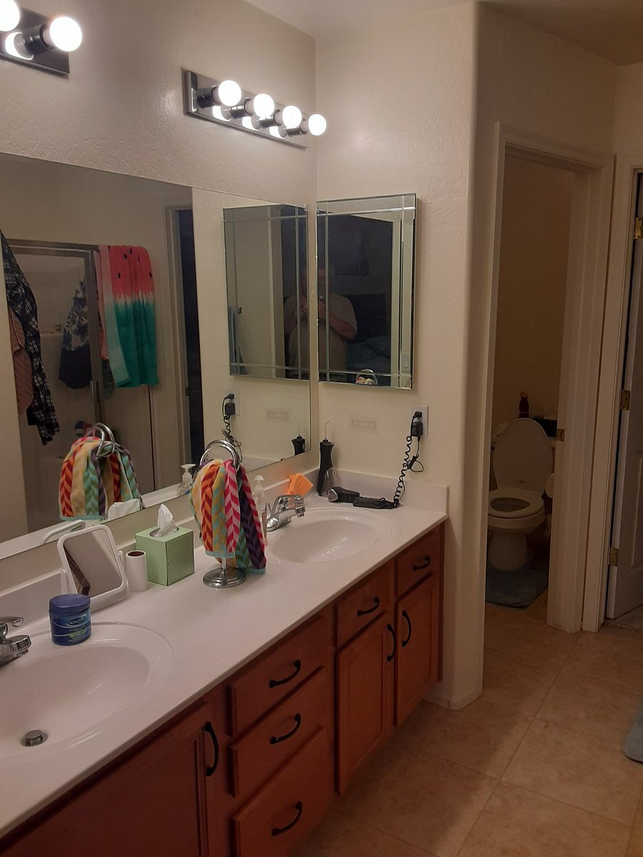 master bath, double sinks, medicine cabinets by both sinks, entry into toilet