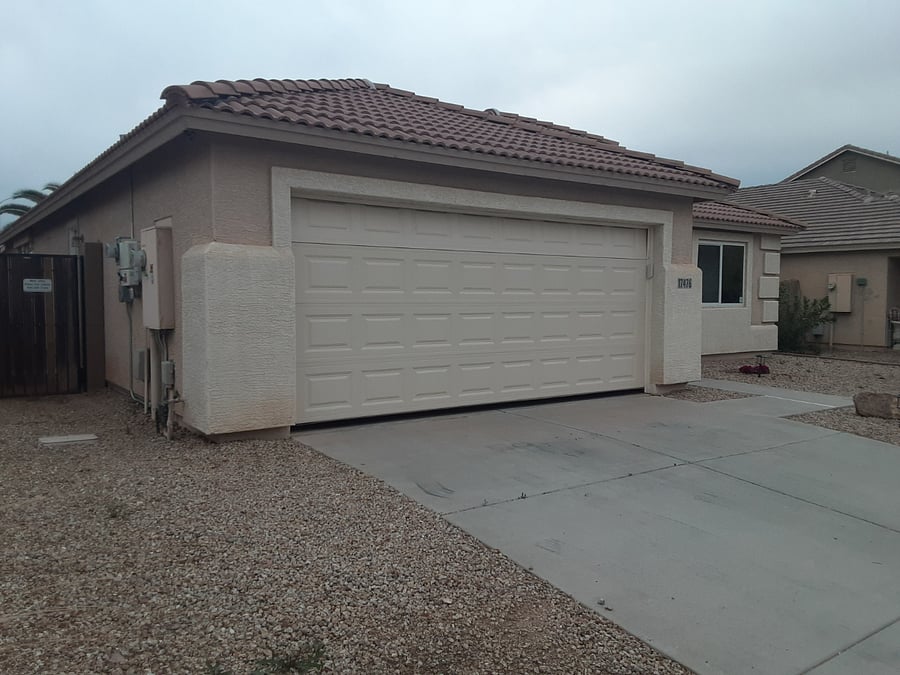 front of house from west side of lot. Unlike most garages at least that we looked during our house search, it will hold a full sized crew cab pickup, shortbox that is!! The outside access to the backyard is on the left or west side of the house.