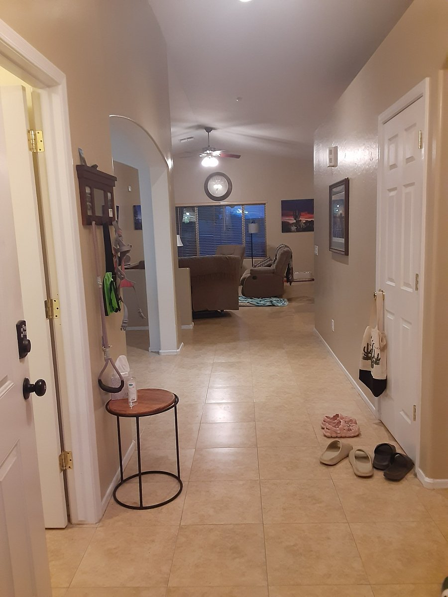 front entrance, washer dryer on the left, closet door on the right, 2 bedrooms and bathroom to the right also just before the closet door.