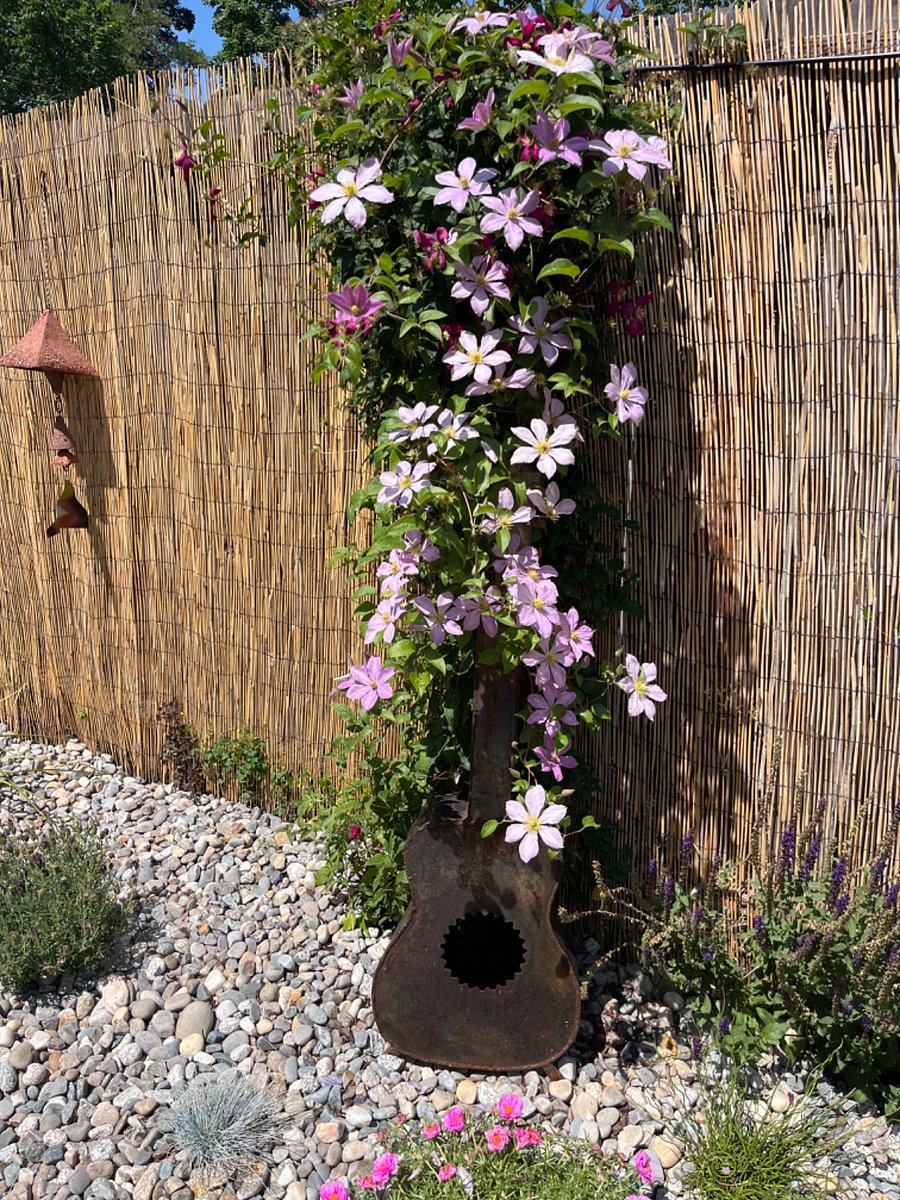 Summer flowers at entrance to the little gem.