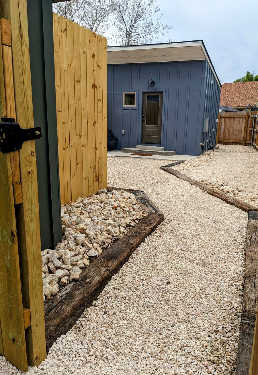 Separate entrance to the tiny house that sits in the back