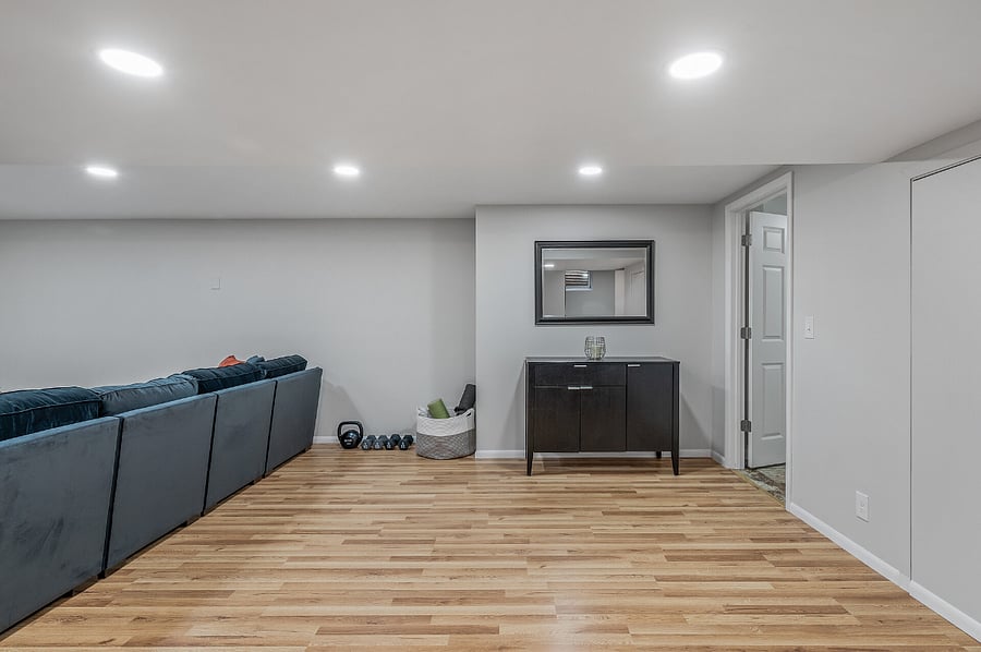 Door leading to bedroom and bathroom on right of image.