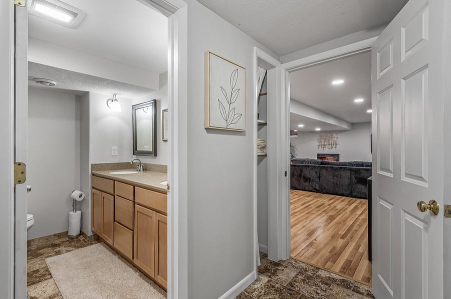Bathroom has lots of storage.