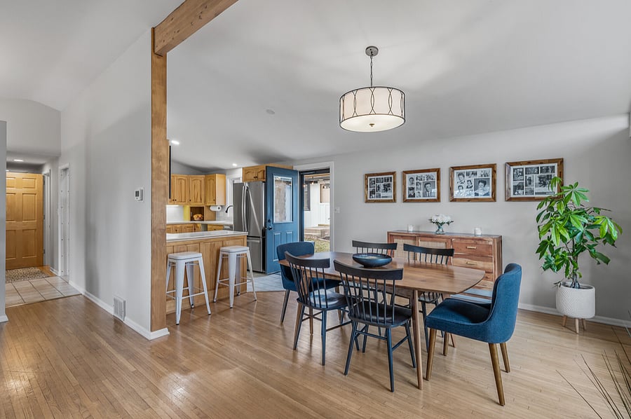 Dining room on main level and door to side patio off kitchen.