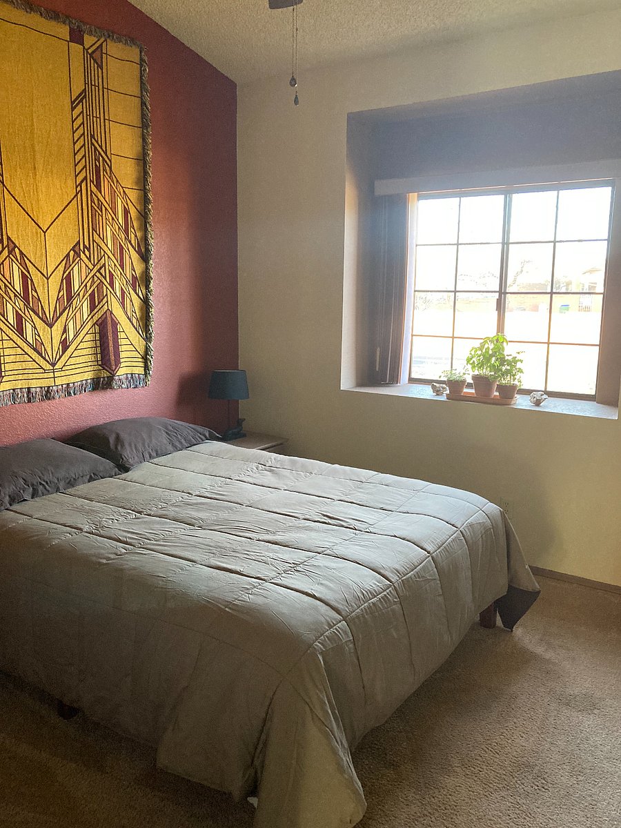 guest bedroom with queen bed