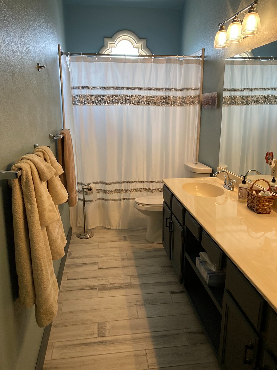 guest bathroom with bathtub/shower