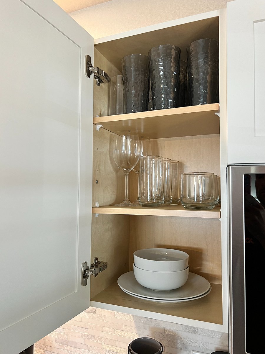 plates, bowls, glassware, and plastic cups