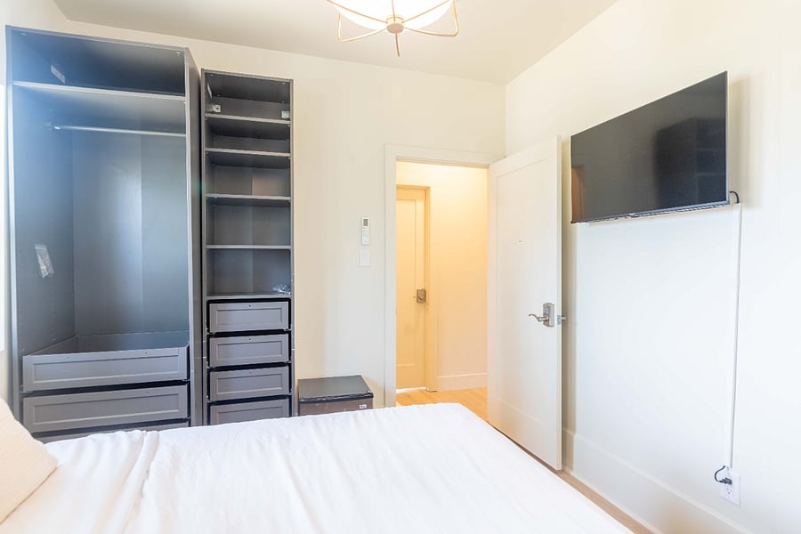 Smart TV and small fridge in the room