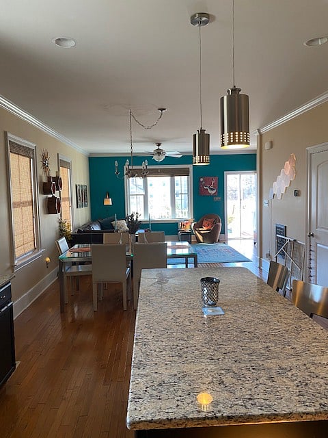 View of dining room and living room from kitchen.
