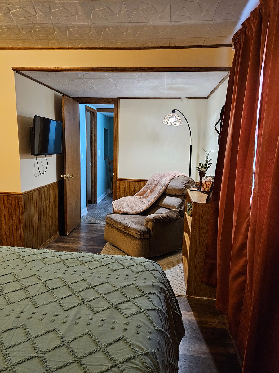 Bedroom reading nook next to bathroom.