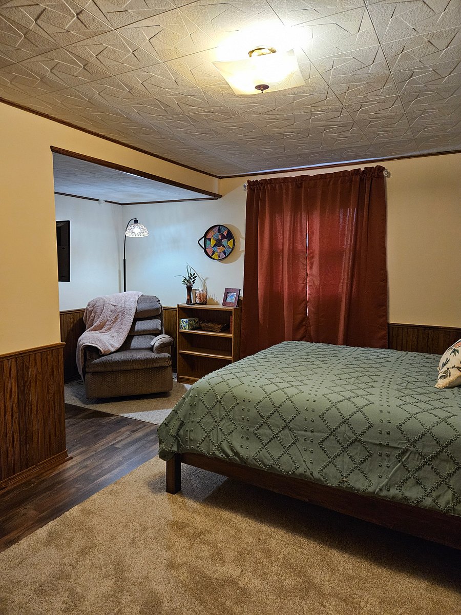 Large bedroom with queen bed, double closet and double dresser.  Cozy reading nook in bedroom!