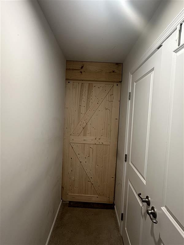 Basement sliding barn door