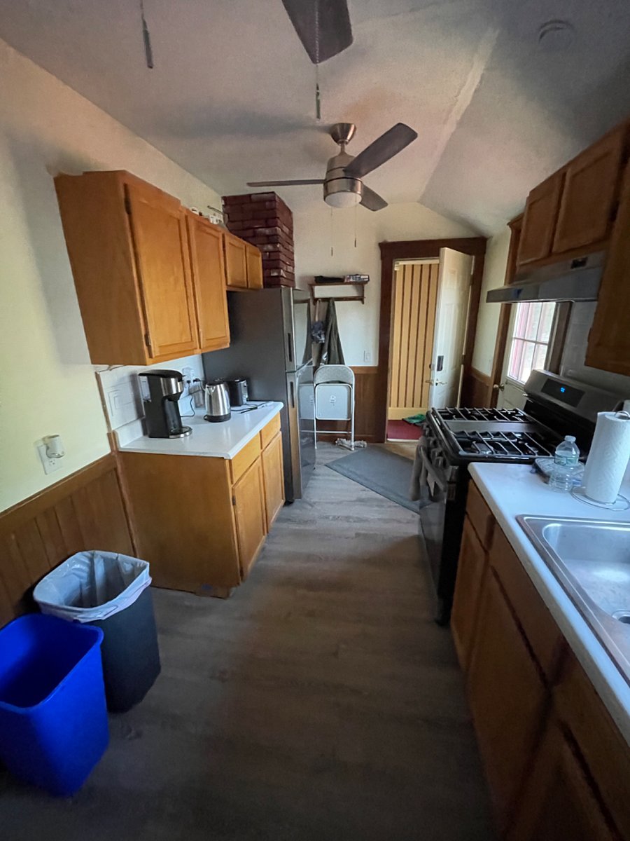 Kitchen with all new appliances: New Refrigerator. Gas range with griddle cooktop and hood. Air fryer. POD coffee maker. Electric kettle. Microwave.