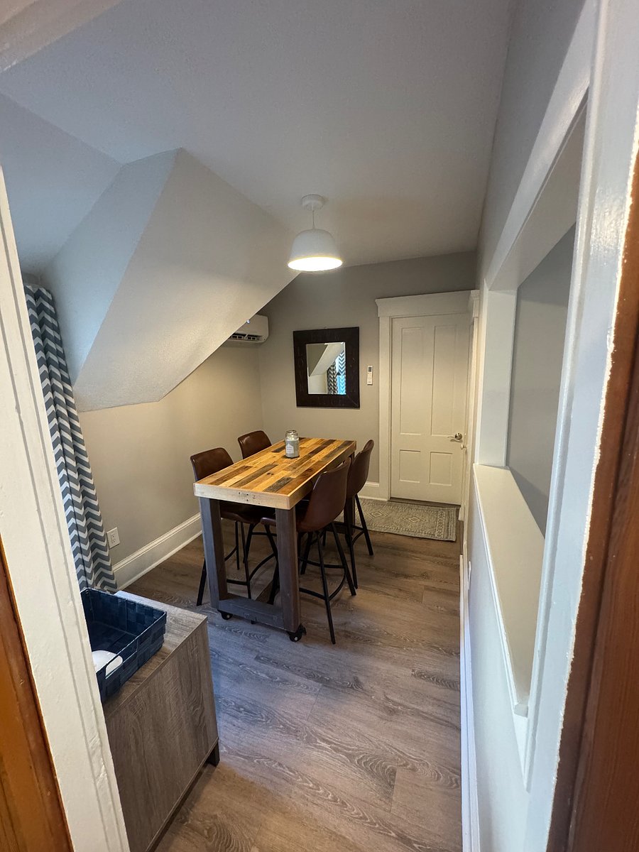 dining area with four chairs.