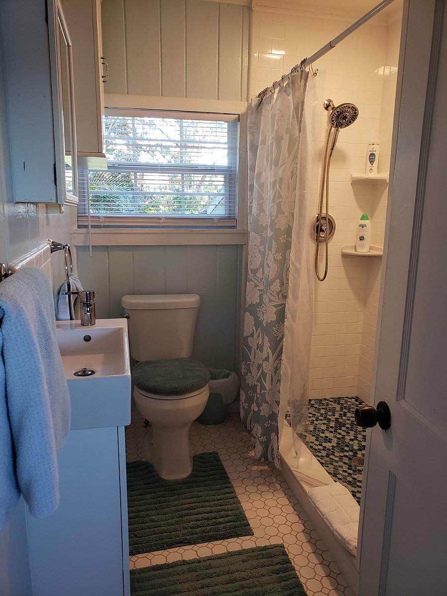 Newly Tiled Large Shower, new toilet and new tile on floors. We provide soap & shampoo.