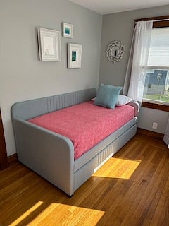 Sunroom with daybed that has a pullout twin trundle