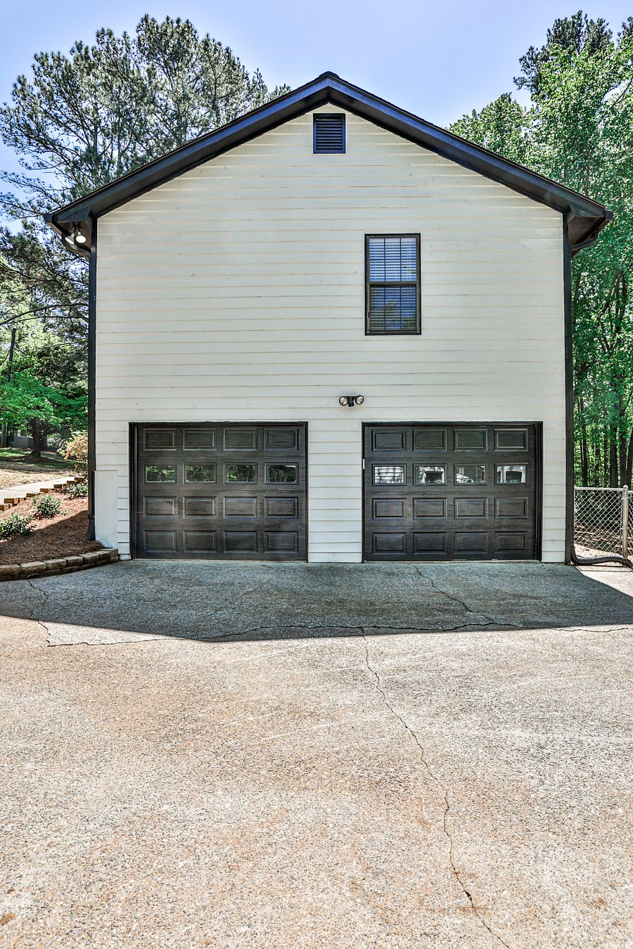 Park with ease in our spacious two-car garage equipped with brand-new garage door openers for added security and convenience