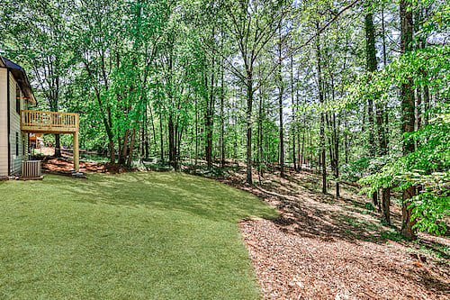 Step out into your own private oasis! Our expansive, fully fenced backyard is a dream come true for families and pet owners. Kids can run and play freely on the lush lawn, while furry friends have plenty of space to explore and stretch their legs. The secure fence ensures everyone's safety, so you can relax and enjoy the fresh air with peace of mind.