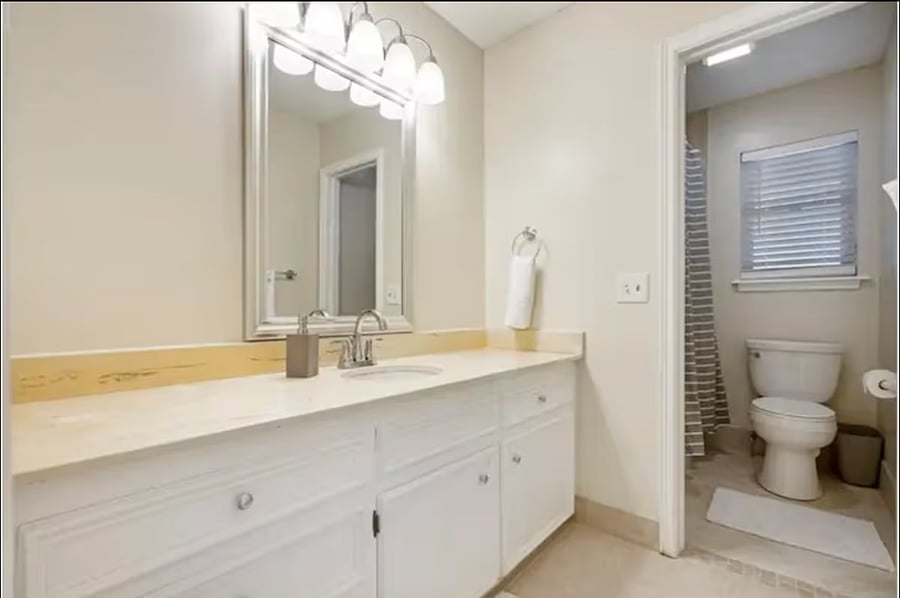 Guest bathroom with tile shower and bathtub