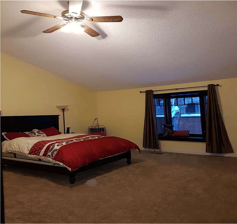 EXTRA large master bedroom! Includes a desk area, double dresser, and closet. You could even fit an extra queen air mattress in here (Yup, I did it when we had friends visiting). Room darkening shades and a ceiling fan makes sleeping during the day a breeze. Master bath is en suite.