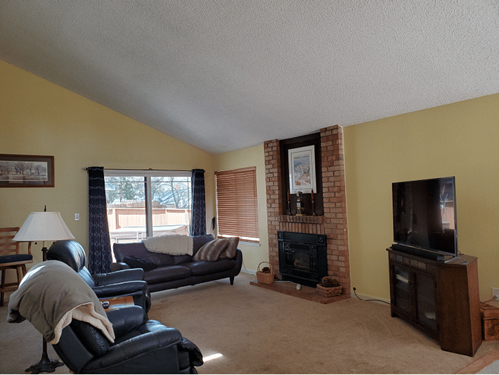 Living area is comfortable and open concept to a beautiful dining area.