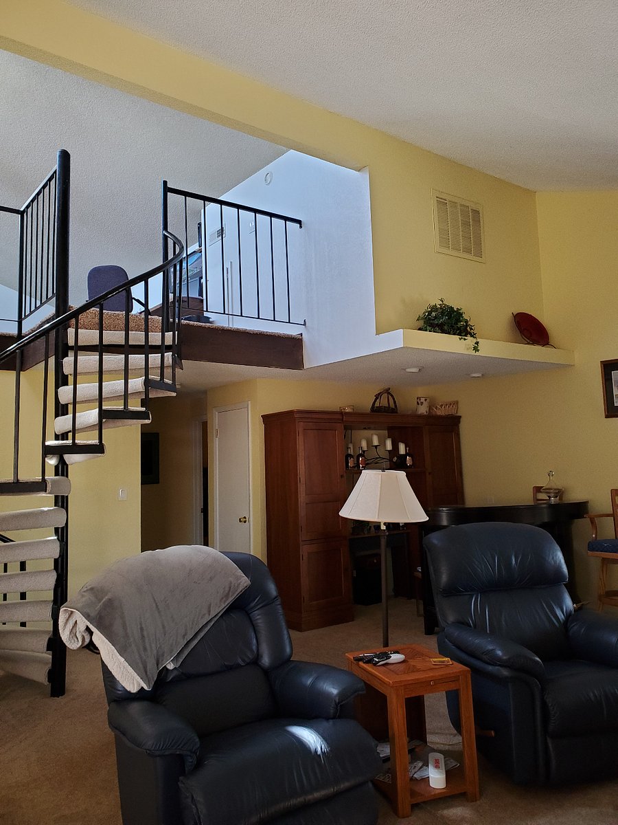 Loft overlooks living room.