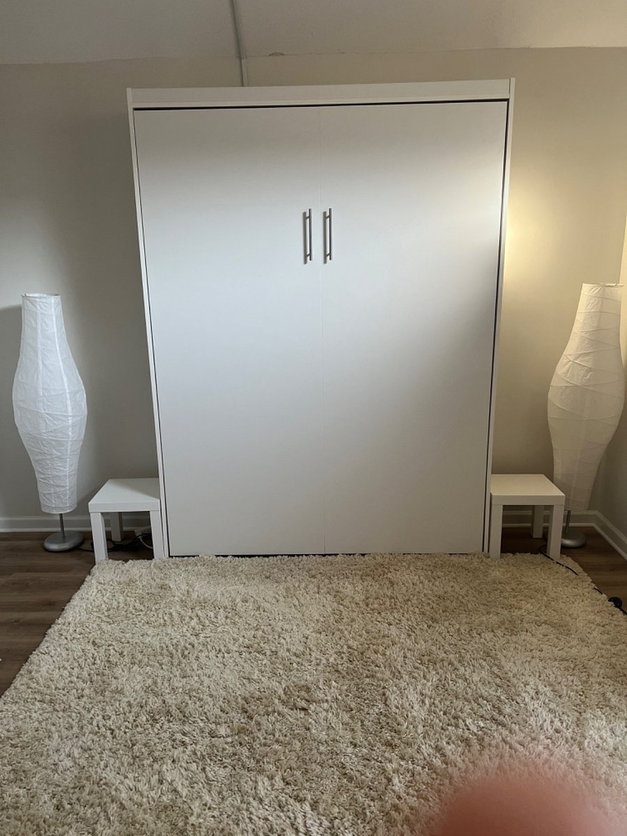 Extremely cozy Murphy bed. Keep it up for full use of space or,