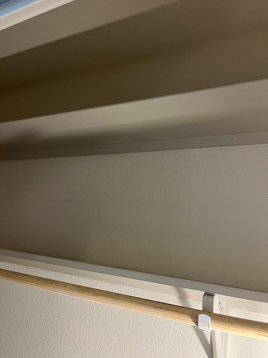 Extra shelves in closet for storage.