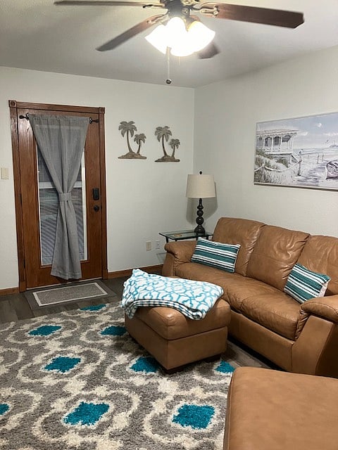 Another shot of the living room, also showing front door private entrance.