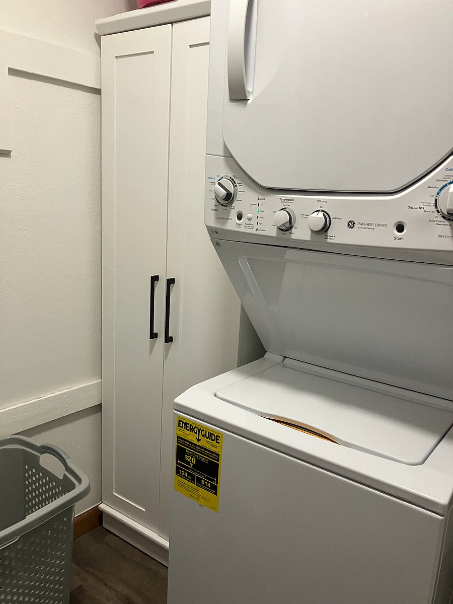 Washer/dryer unit in laundry room of apt.
