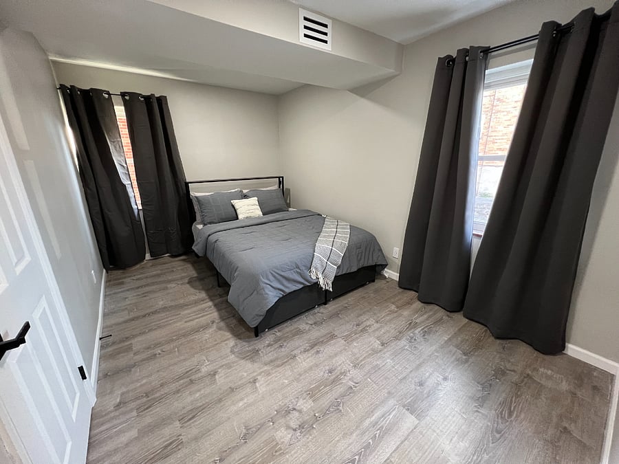 Large Queen bed with LED lighted head board / shelf and USB and power outlet to charge you devices over night.