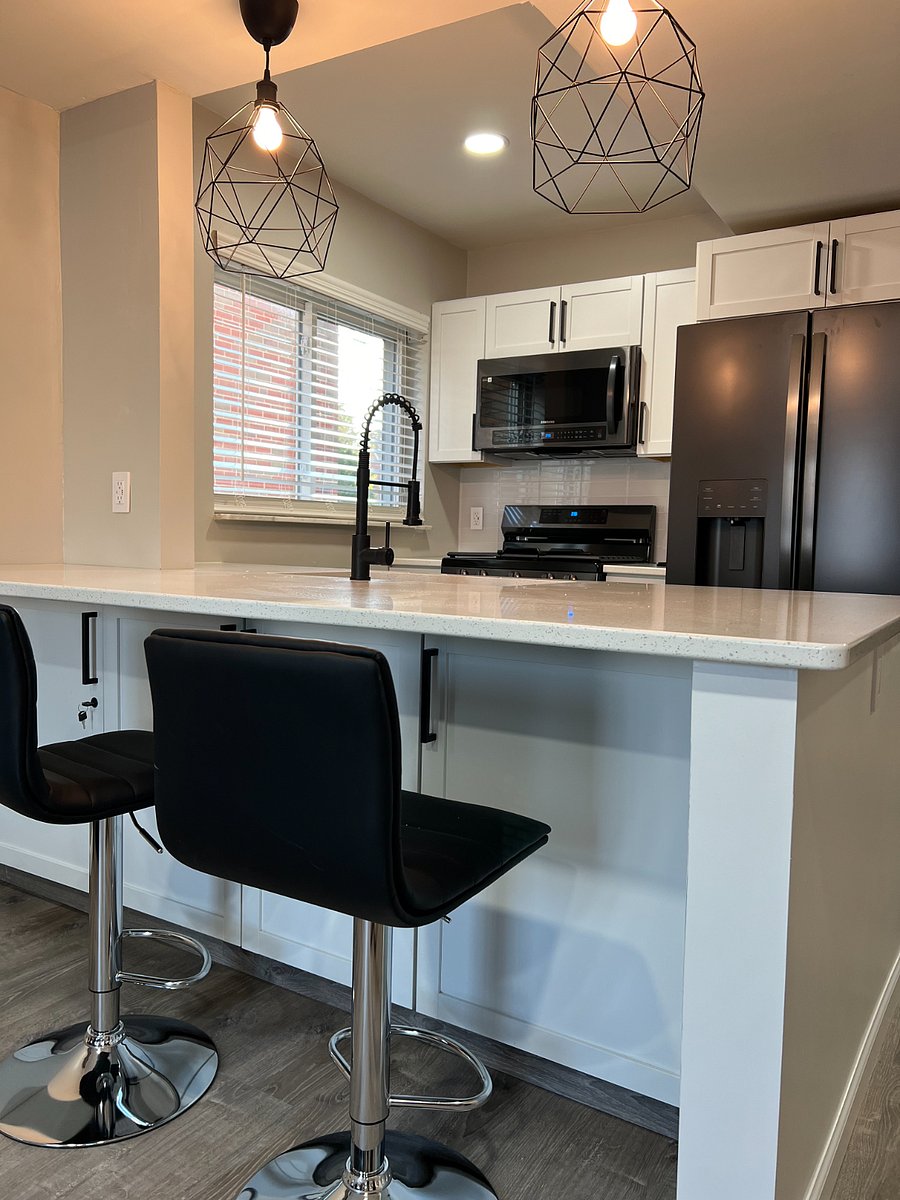 extra storage in front of the bar stools.