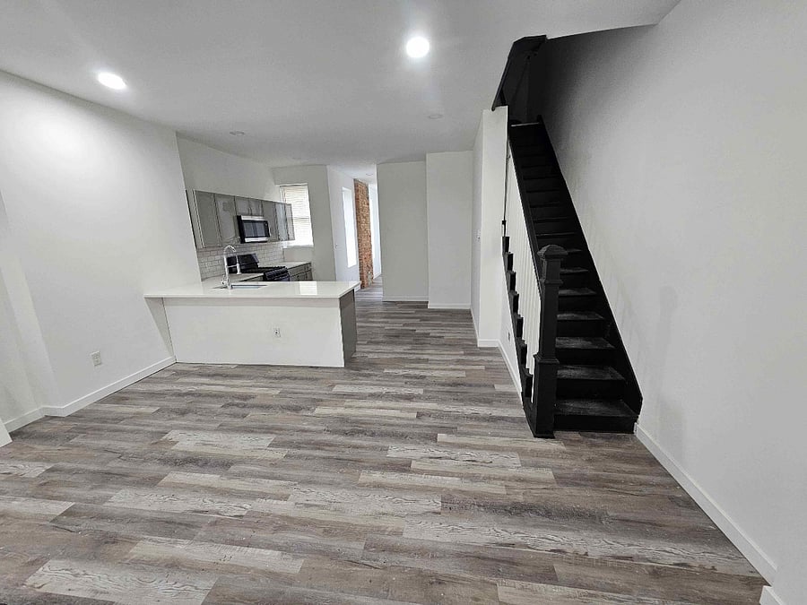 1st floor Common Area - Common Area Kitchen; stairs to 2nd floor