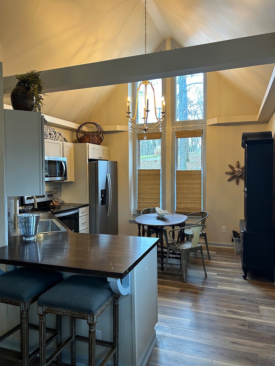 New fully equipped kitchen with stainless steal appliances, cathedral ceilings, and butcher block counter tops