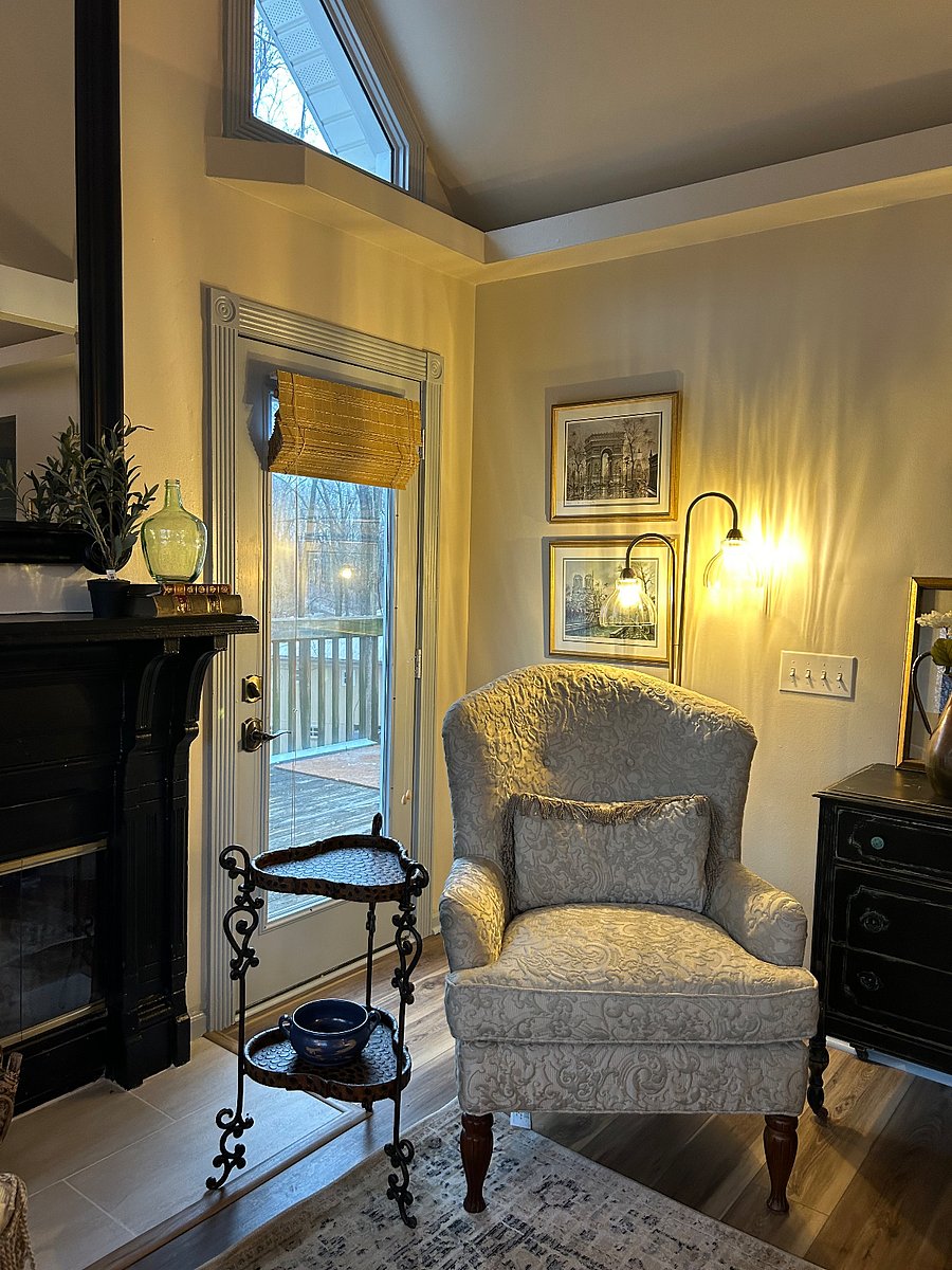 cozy seating located throughout cottage with French art fueling a European environment throughout