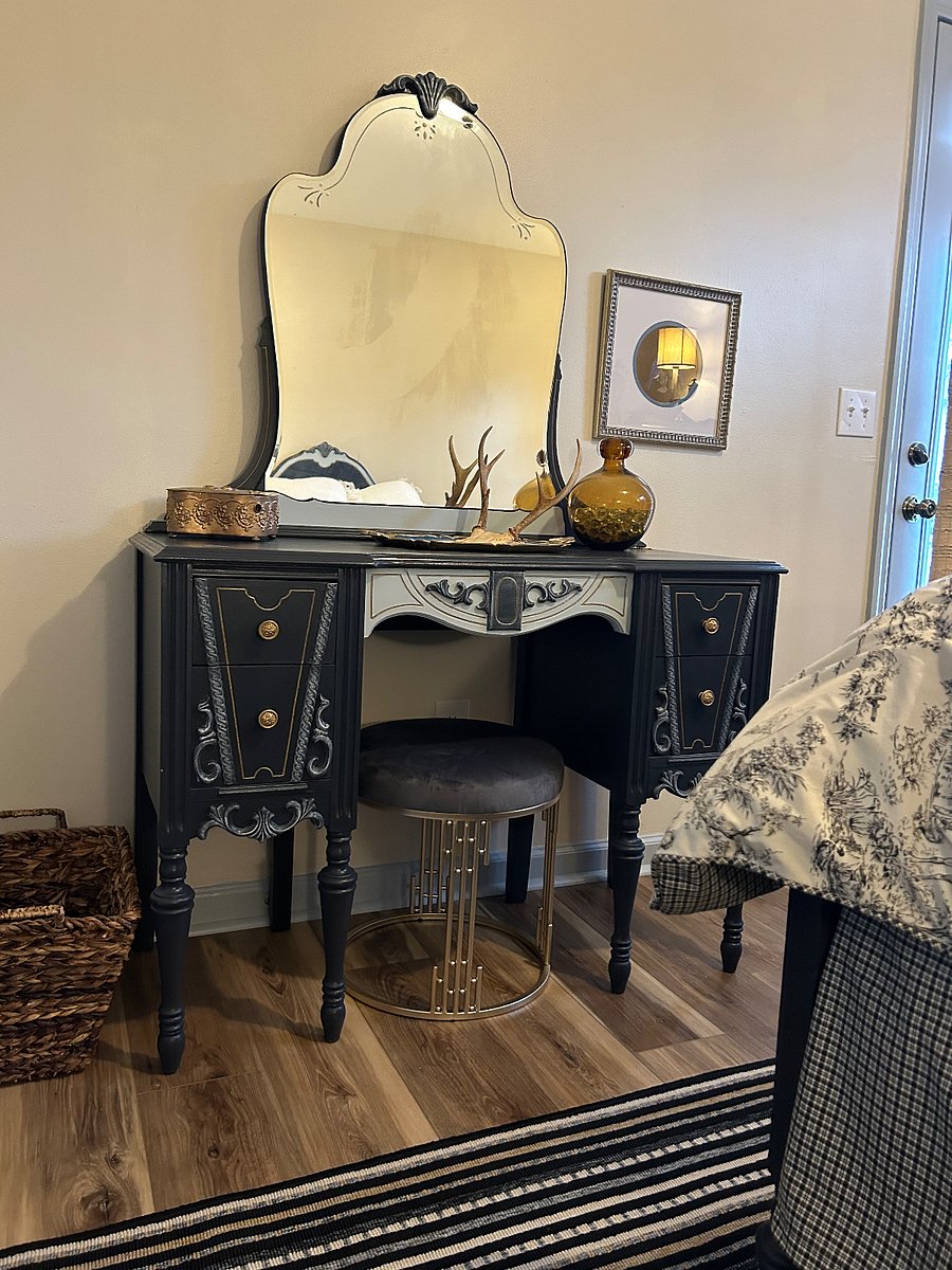Darling vanity in 2ndary bedroom custom painted with creative flair