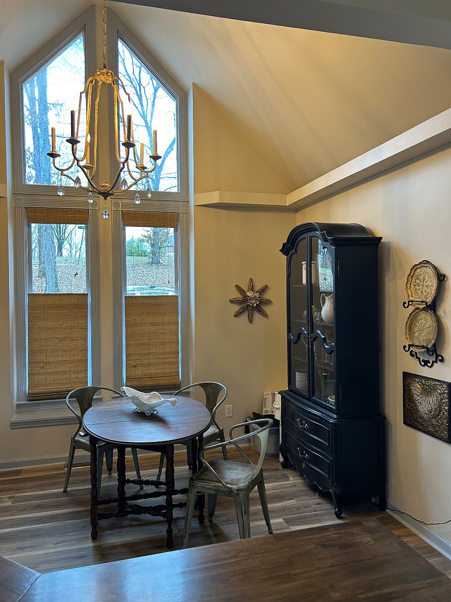 Eat in kitchen with place settings for eight