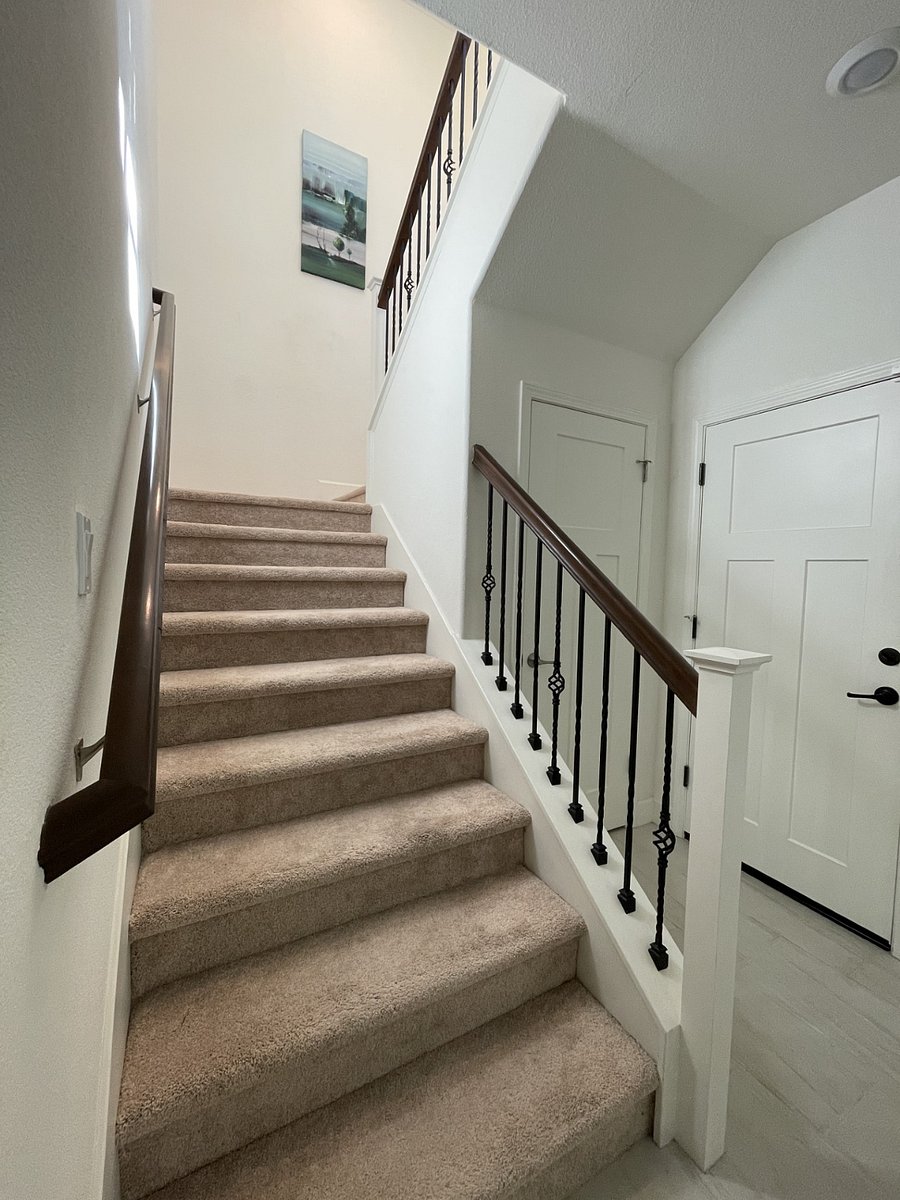 Stairs go to 3 bedrooms, laundry room, and second living room upstairs.